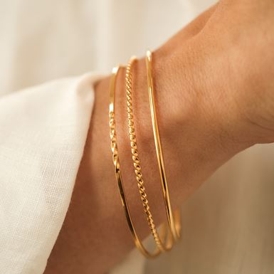 Uma gold bangles sales