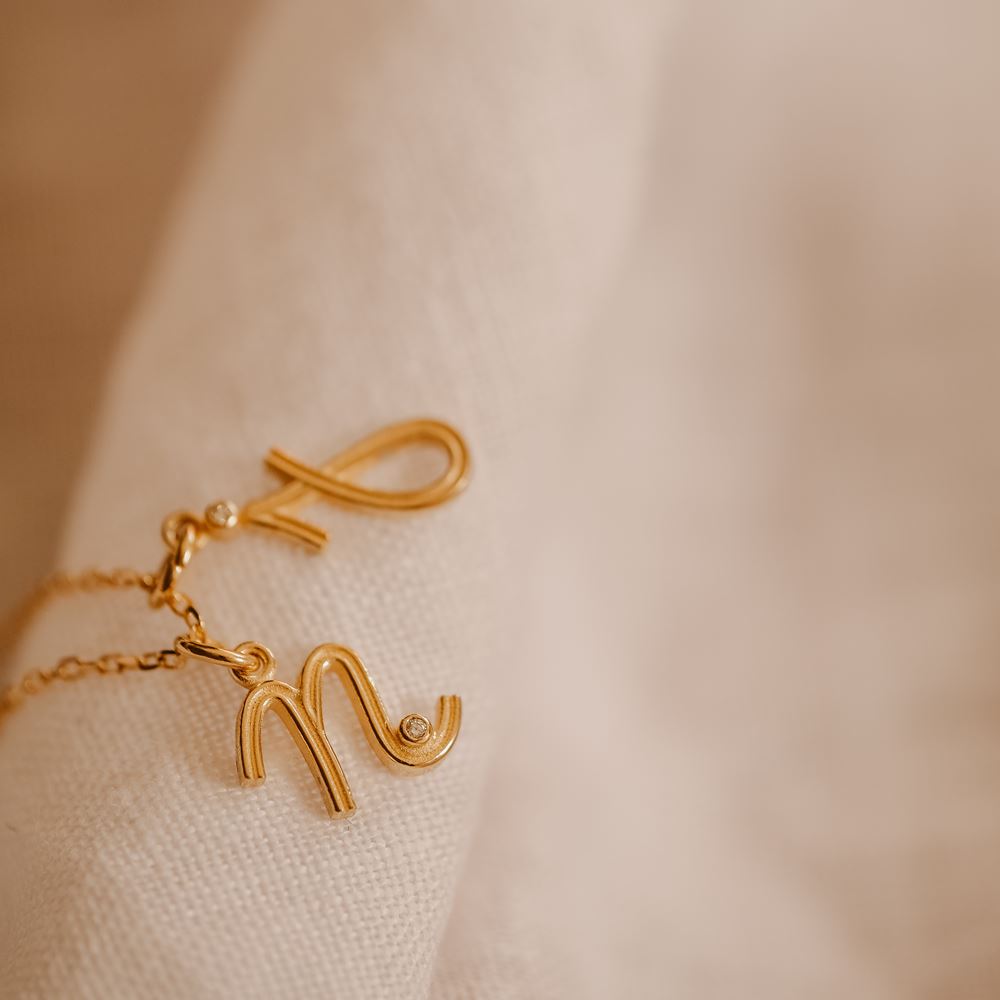 Pendentif "L'alphabet" (plaqué or)