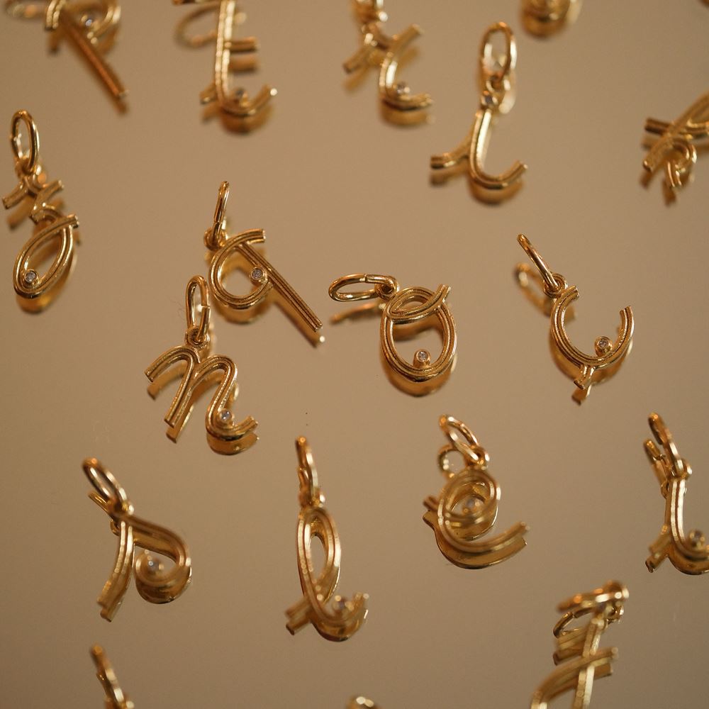 Pendentif "L'alphabet" (plaqué or)