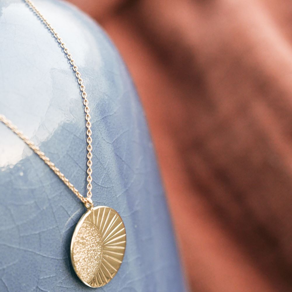 Halsketting De tuimelaar (18k goud)