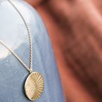 Halsketting De tuimelaar (18k goud)