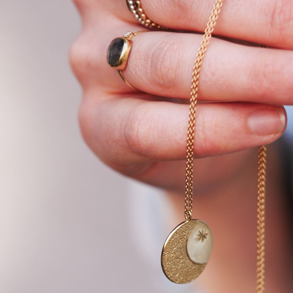 Halsketting De tuimelaar (18k goud)