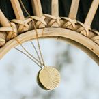 Halsketting De tuimelaar (18k goud)