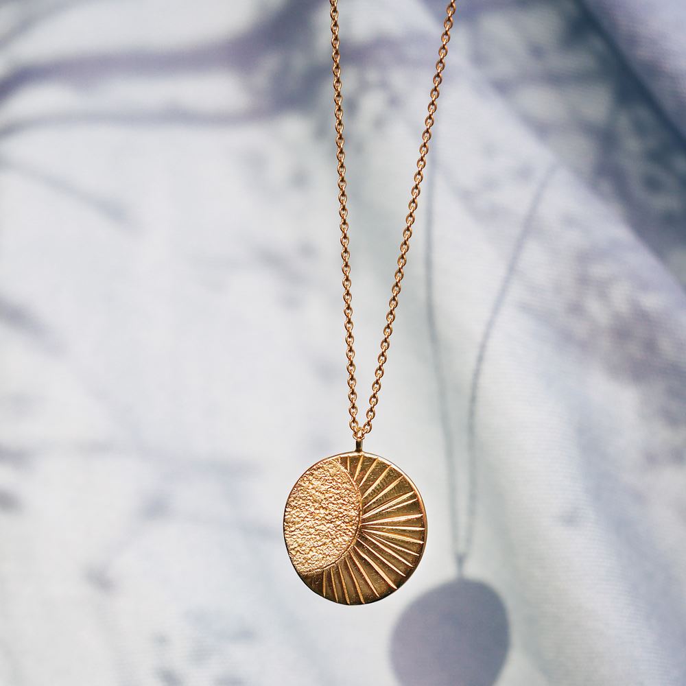 Halsketting De tuimelaar (18k goud)